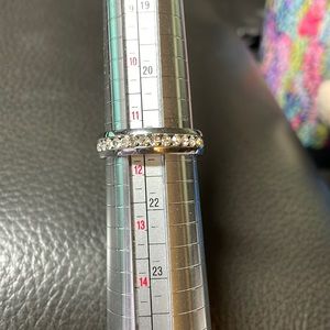 Anniversary Ring. Stones all the way around the ring. CZ stones.